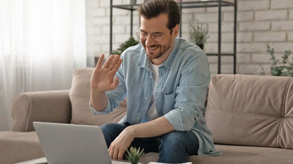 A man on a teleheatlh call. 