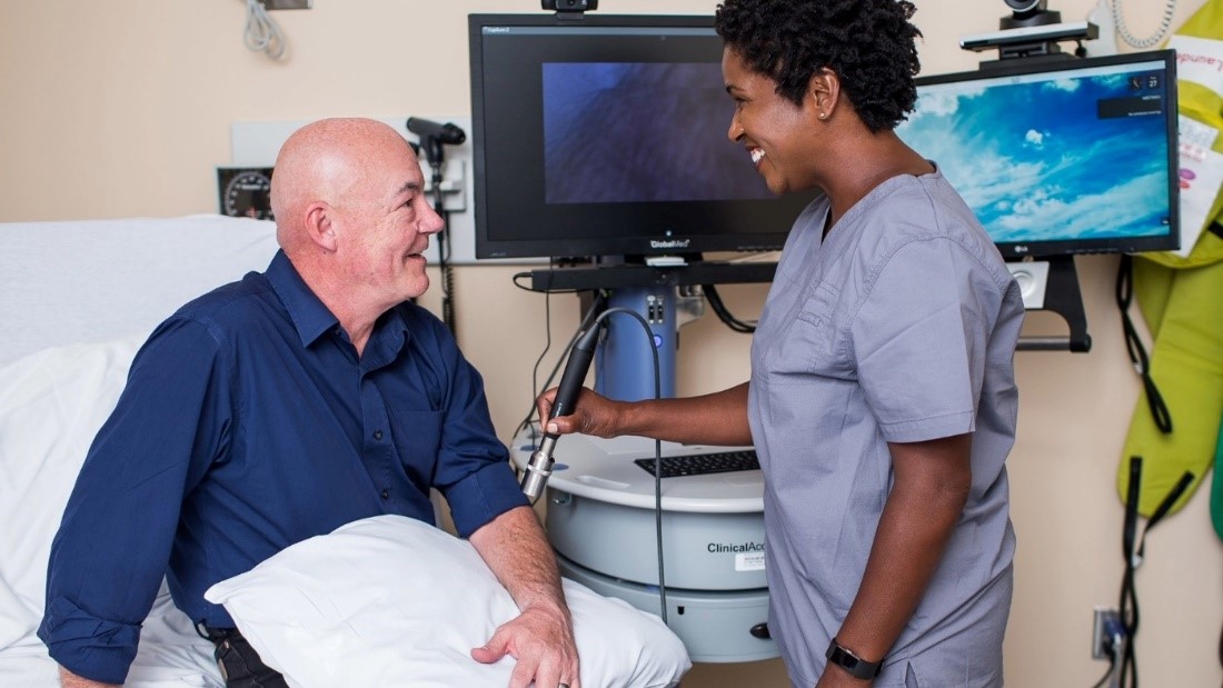 A Veteran receiving a skin scan. 