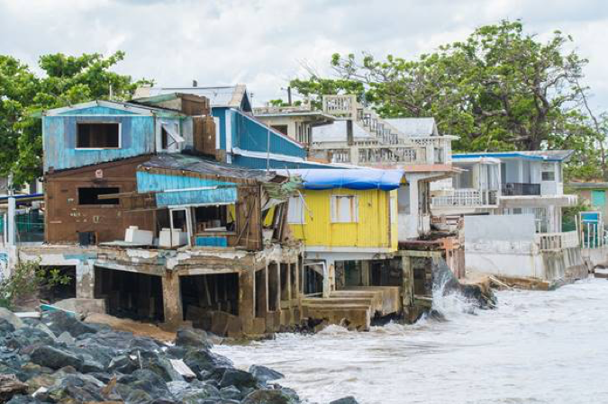 Photo of water hitting shoreline during hurricane