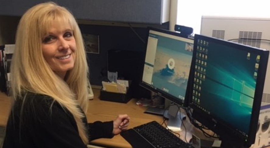 Nurse conducts a telehealth appointment on a computer