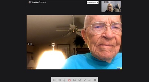 100-year-old Veteran on-screen talking to his VA provider by video