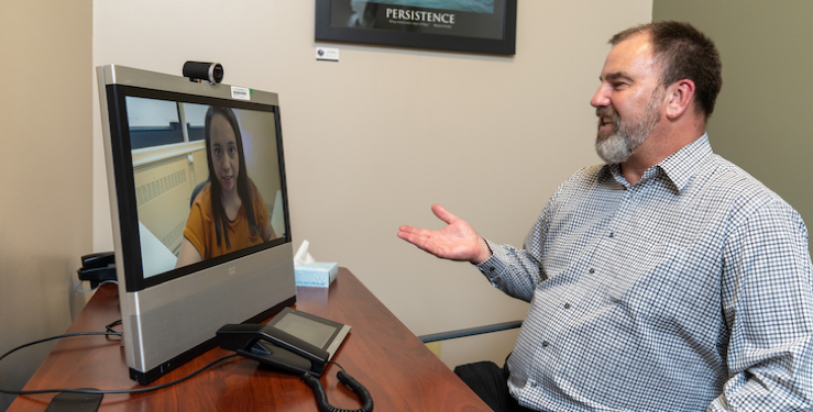 Patient and provider on a video call appointment.