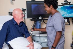 A Veteran receiving a skin scan. 