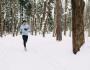 A man running in the snow. 