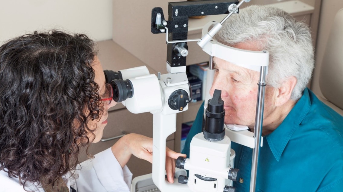 older Veteran undergoes eye exam